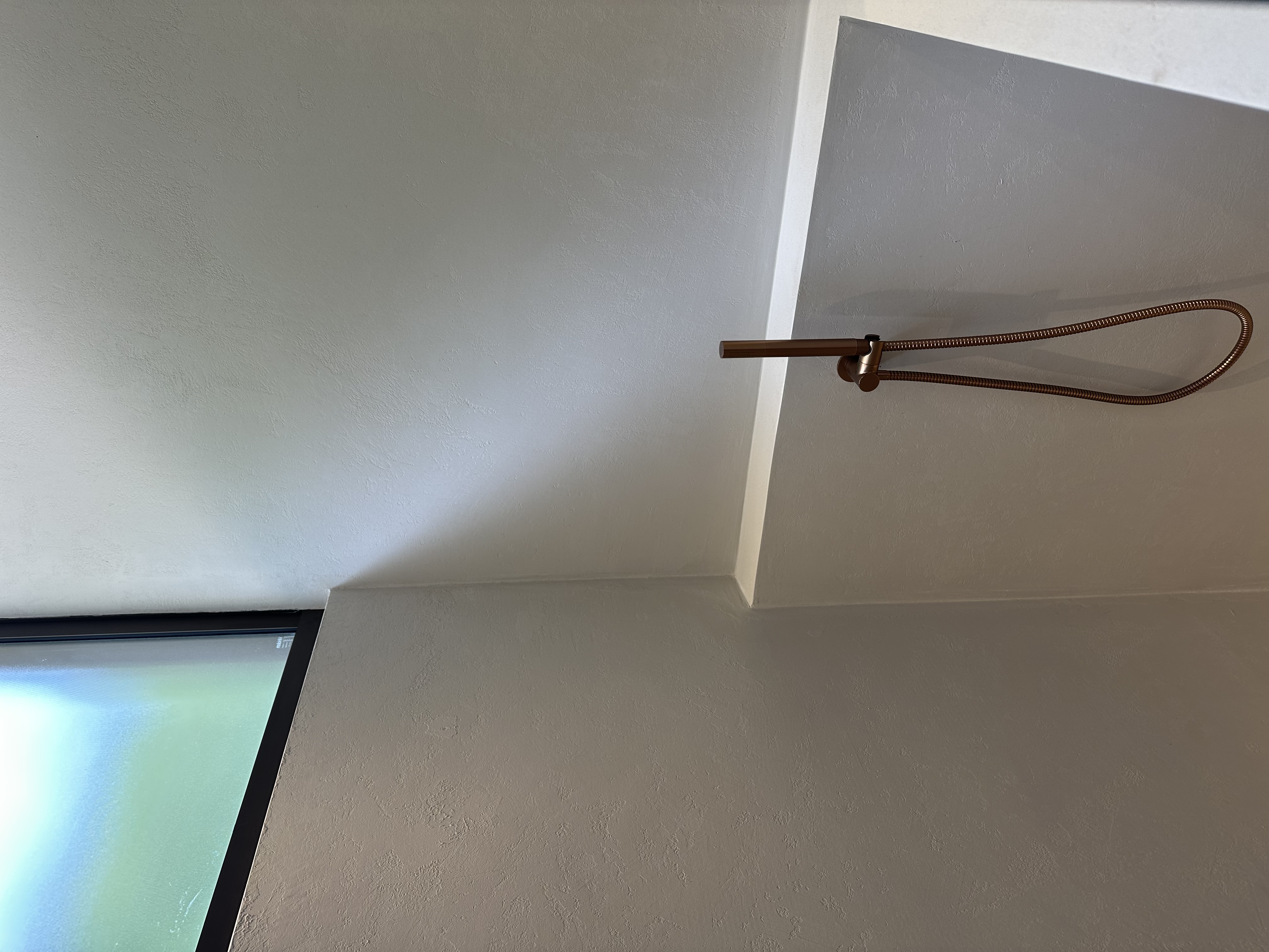 Seamless microcement wall detail